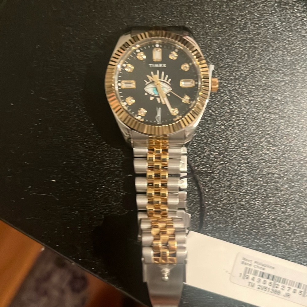 Jacquie aichex timex watch